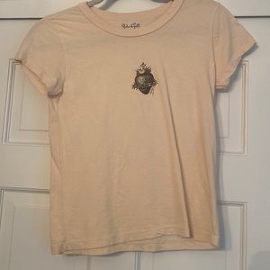 Cream Top from Brandy Melville. Heart Detail